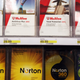 Boxes of McAfee security software are displayed alongside Norton Anti-virus software by Symantec on a shelf at a Target store August 19, 2010 in Colma, California.